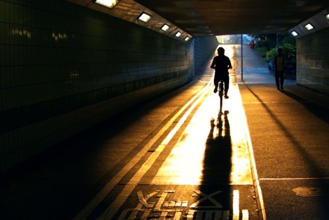Same tunnel scene after the Urban Pop LUT, with deeper shadows and warmer golden light