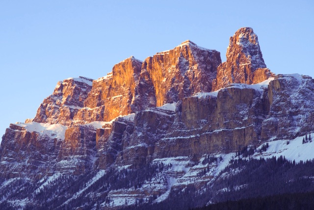 After: Rugged mountain peak lit by warm sunrise light, edited with the free Landscape LUTs