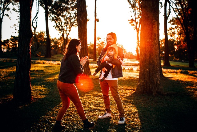 After: Family playing in a park at golden hour, edited with the free Lifestyle & Commercial LUTs